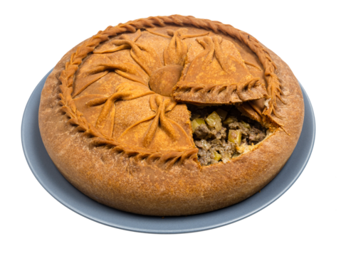 Tatar cuisine - open Zur Belish Tatar Big Pie (close baked pie from unleavened dough with meat and potato fillings) on plate isolated on white background