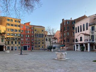 closed wells on square in jewish Ghetto in Cannaregio district in Venice city in winter evening