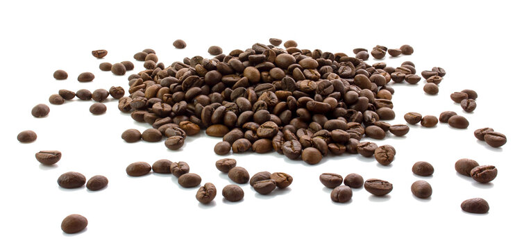 Scattered coffee beans isolated on white background. Photo to create a collage with easy transfer to other images.