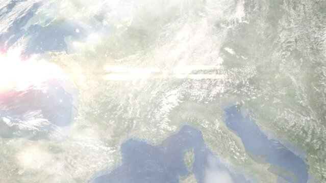 Earth zoom in from outer space to city. Zooming on Vevey, Switzerland. The animation continues by zoom out through clouds and atmosphere into space. Images from NASA