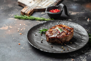 grilled meat barbecue steak on a wooden board. banner, menu, recipe place for text, top view