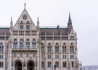 Fototapeta na wymiar Beautiful old building of the Hungarian Parliament in neo-Gothic style
