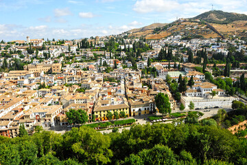 Fototapeta na wymiar Scenic view of the famous Albaicin neighborhood from the Alhambra in Granada, Andalusia, Spain. The Albaicin is a UNESCO World Heritage Site.