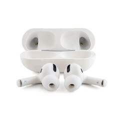 wireless white headphones with a case. isolated on white background