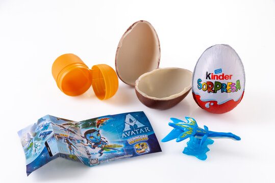 Alba, Italy - February 20, 2023: Kinder Surprise milk chocolate eggs with surprise gadget Avatar toy. Kinder Surprise is a world famous Ferrero brand