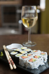delicious rolls of rice with fish or makis, with their oriental chopsticks