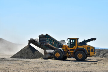 Machine bulldozer excavator on construction site quarry - 574031794