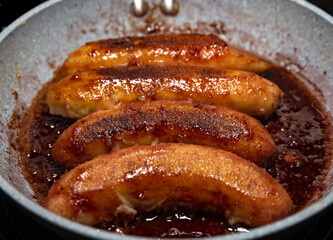 Ripe bananas caramelized with butter, honey, wine and cinnamon.