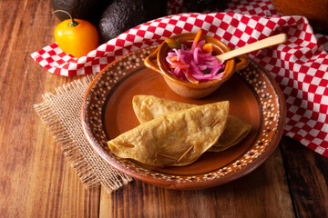 Quesadillas Doradas. Fried quesadillas made with corn tortillas, they can be filled with any dish or ingredient, such as meat, potato or fish such as marlin or tuna, popular during the Lenten season.