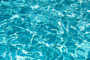 Fototapeta premium Water in swimming pool, background with high resolution. Wave abstract or rippled water texture.