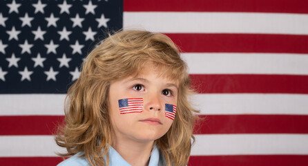 Independence day 4th of july. Child with american flag. American flag on kids cheek. Usa fan.