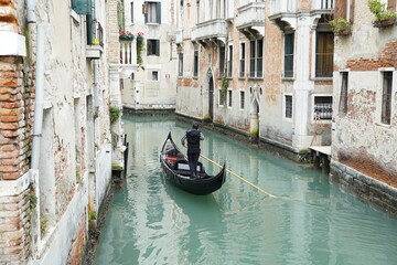Fototapeta na wymiar Beautiful Gondola on Venice canals