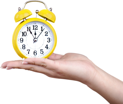 Retro alarm clock in hand