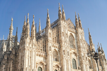 Fototapeta premium Milan, Italy - February 15, 2023: Milan Cathedral in Piazza Duomo during the day, Milan. Cathedral of the Duomo.