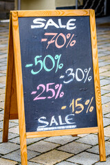 sale sign at a shop window