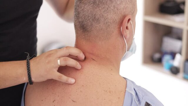 Man having chiropractic back adjustment close up. Osteopathy, Alternative medicine, pain relief concept