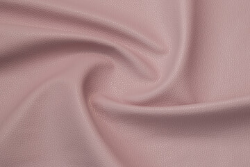 pink artificial leather with waves and folds on PVC base