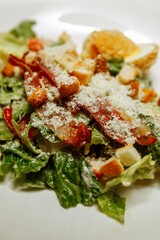 Healthy Grilled Chicken Caesar Salad with Cheese and Croutons