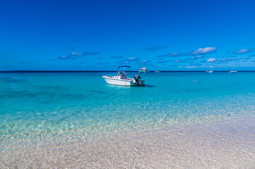 A view from the shore on the island of Grand Turk on a bright sunny morning