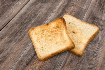 Fresh homebaked bread. Slices on desk
