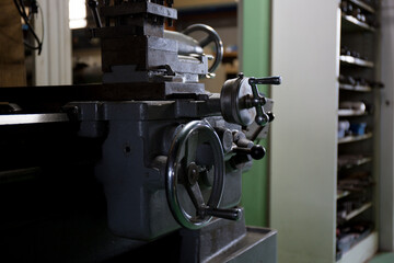 A handle that turns an axis on a lathe
