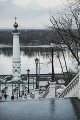 A staircase with many steps descending to the Dnieper River in the center of the city of Kyiv, with...