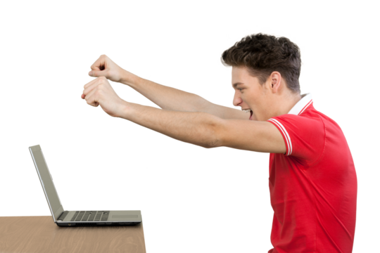 Portrait of handsome happy young man sitting near table with laptop isolated on white