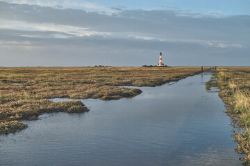 Lighthouse Westerheversand on high tide. High quality photo