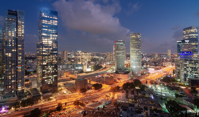 Tel Aviv night aerial panorama. Modern glass skyscrapers