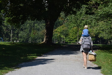 Mom and Son Walking in Park