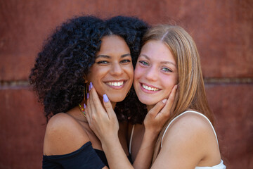 happy caucasian and afro american friends - 574073102