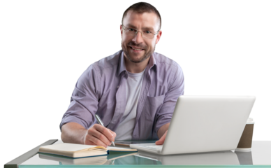 Happy cheerful businessman working on a laptop in office.