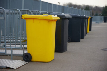 rubbish bin, Yellow and black trash can, for packing garbage