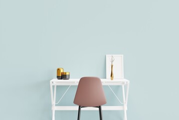 A bright desk with ornaments and a chair. Minimalist concept, modern and nice office for work....