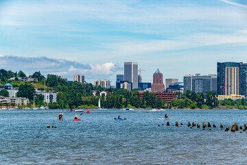 Portland, OR River City Skyline While People Enjoy the Willamette River