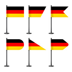Realistic various German table flags on a black steel pole. Souvenir from Germany. Desk flag made of paper or fabric, shiny metal stand. Mockup for promotion and advertising. Vector illustration