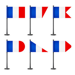 Realistic various French table flags on a black steel pole. Souvenir from France. Desk flag made of paper or fabric, shiny metal stand. Mockup for promotion and advertising. Vector illustration