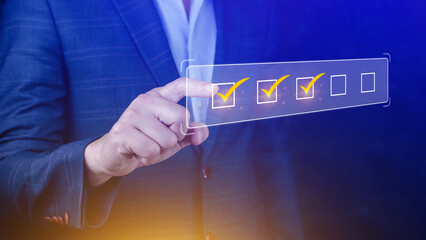 Businessman tick correct sign mark for document approve , project acceptance and quality assurance concept, take an assessment, questionnaire, evaluation, online survey online exam check list