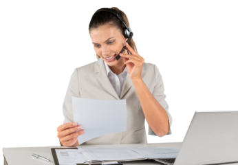 Businesswoman working with laptop and phone on background
