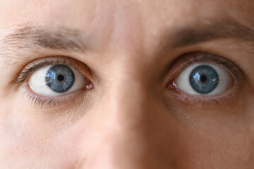 Man with blue eyes, closeup