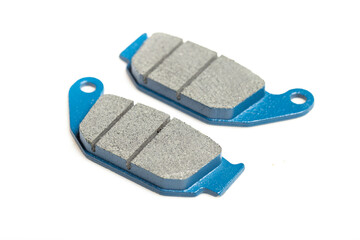 Motorcycle brake pads isolated on white background, close-up image