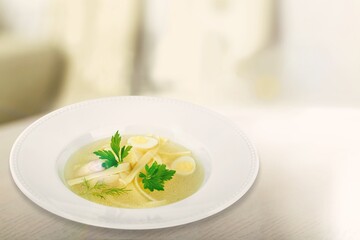 Tasty fresh hot soup dish in a bowl