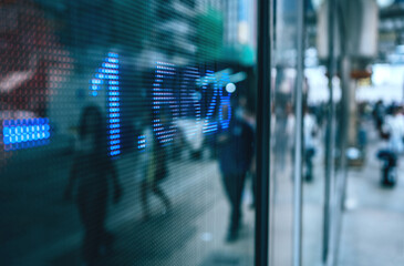 Financial stock market numbers and city lights