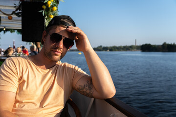 Man is enjoying his vacation on a cruise ship