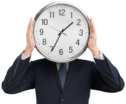 Businessman holding big clock in hands, Business Time Concept