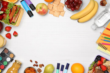 Frame of lunch boxes with healthy food and stationery on white wooden table, flat lay. Space for text