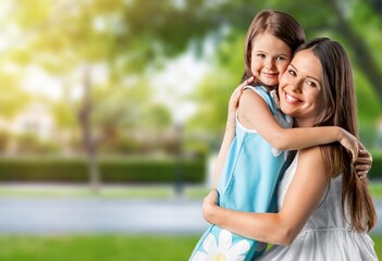 Naklejka premium Young happy mother and child outdoors