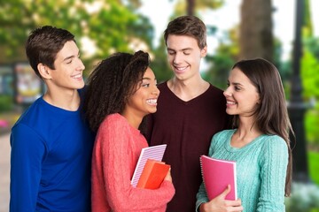 Happy group of young university students.