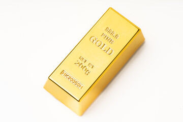 gold ingot on a white background