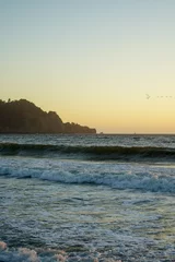 Photo sur Plexiglas Plage de Baker, San Francisco Shot of the sunset at Baker Beach in San Francisco, California